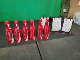 Christmas Coke Bottle  Collection Still has Soda in them
