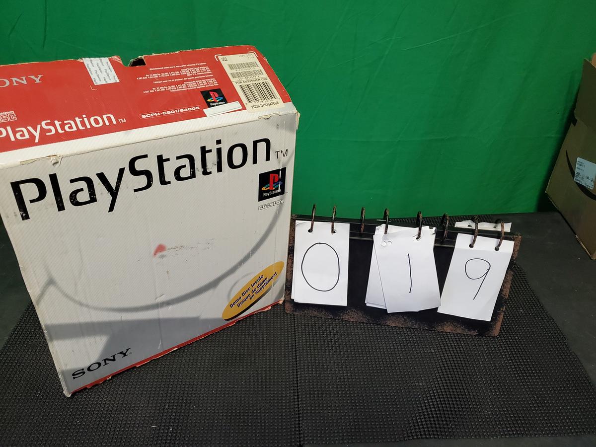 Original Playstation with box and two controllers