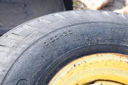 TWO 10.00-20 TIRES WITH 8 BOLT RIMS