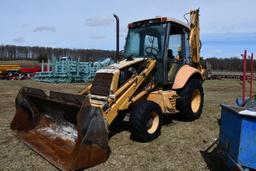 NEW HOLLAND 555E BACKHOE