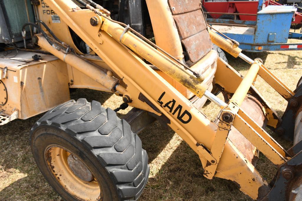 NEW HOLLAND 555E BACKHOE