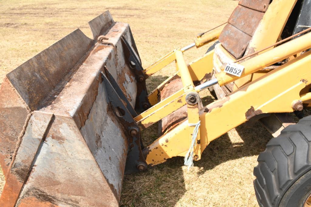 NEW HOLLAND 555E BACKHOE