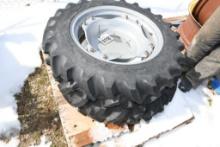 TWO TITAN 9.5-24 TIRES WITH RIMS & 6 BOLT CENTERS (UNUSED)