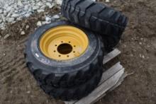 Set of 4 New Forerunner 10-16.5 Skid Steer Tires on 8 Lug Rims