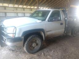 2006 Chevy 2500Hd truck with Cannonball Hay bed w/ front grill guard.