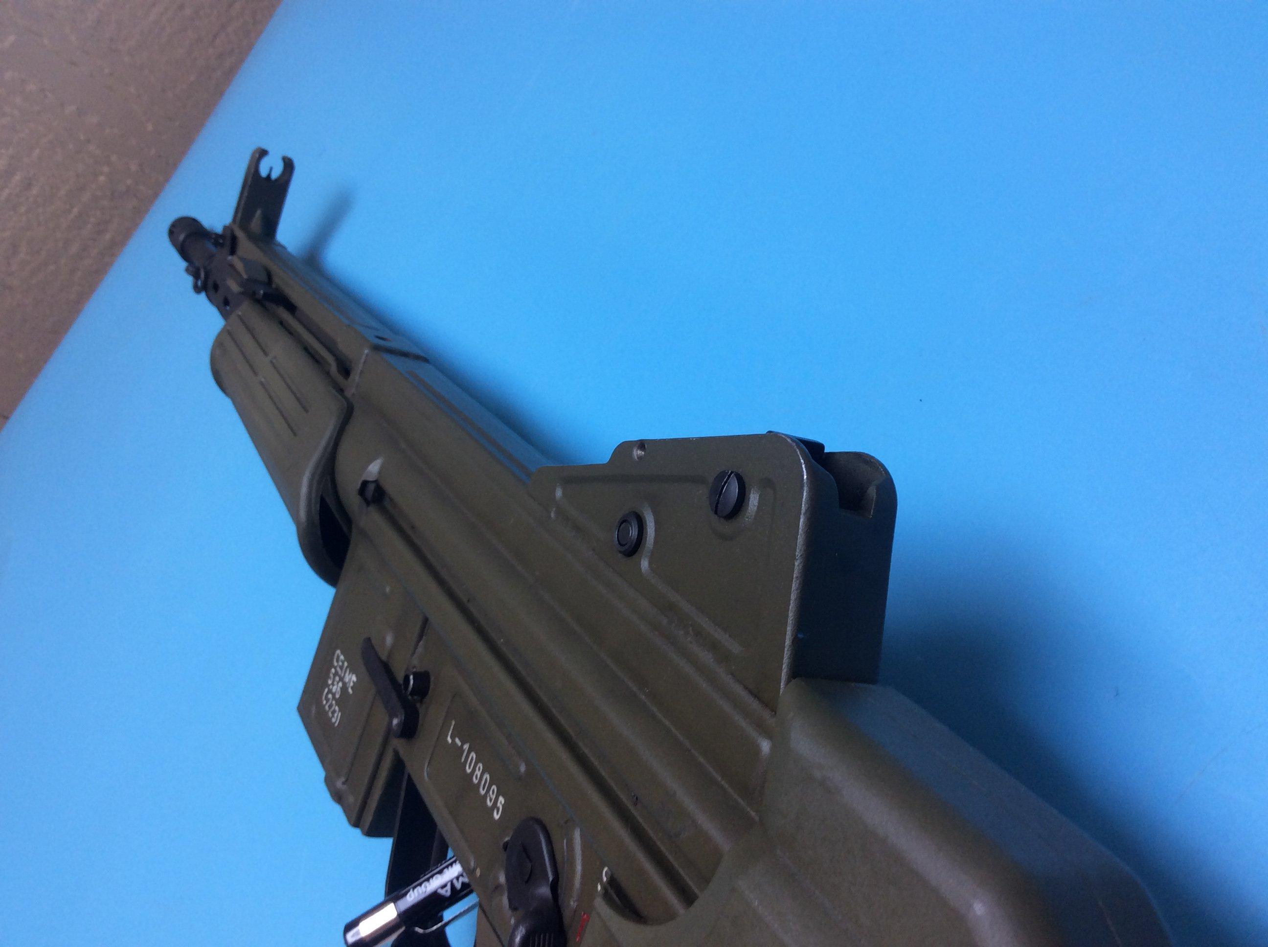 C.A.I/CETNE Fully Automatic Rifle 5.56/223 caliber with an army green finis