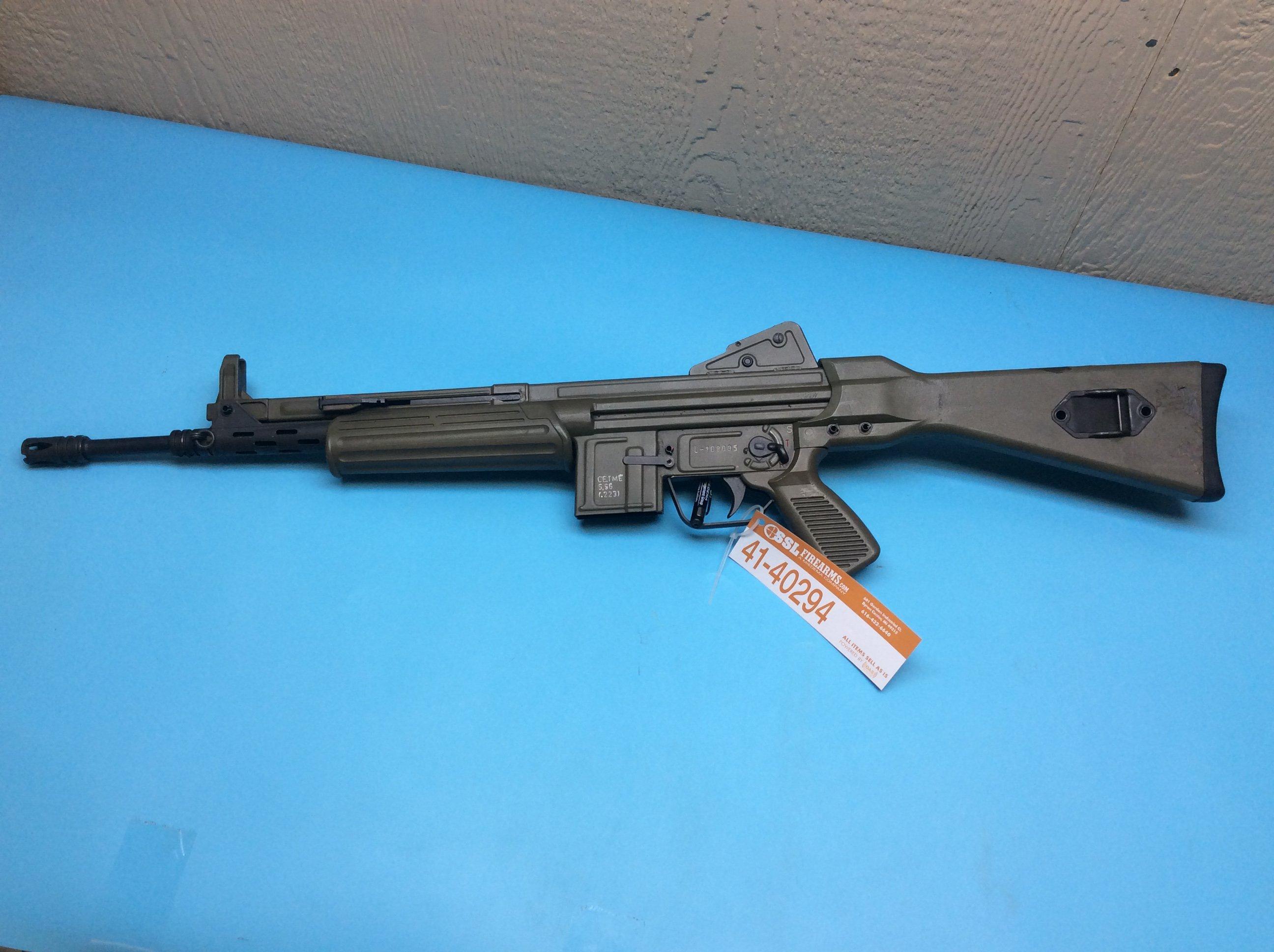 C.A.I/CETNE Fully Automatic Rifle 5.56/223 caliber with an army green finis