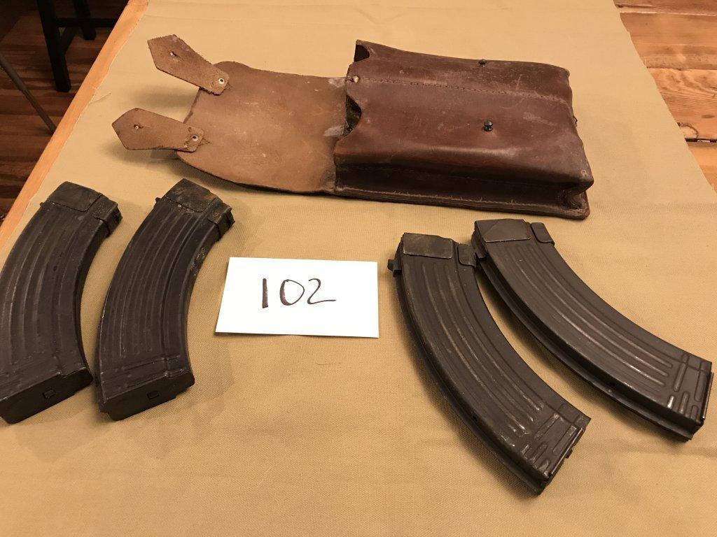 four Czech AK47 ammo Clips and leather pouch