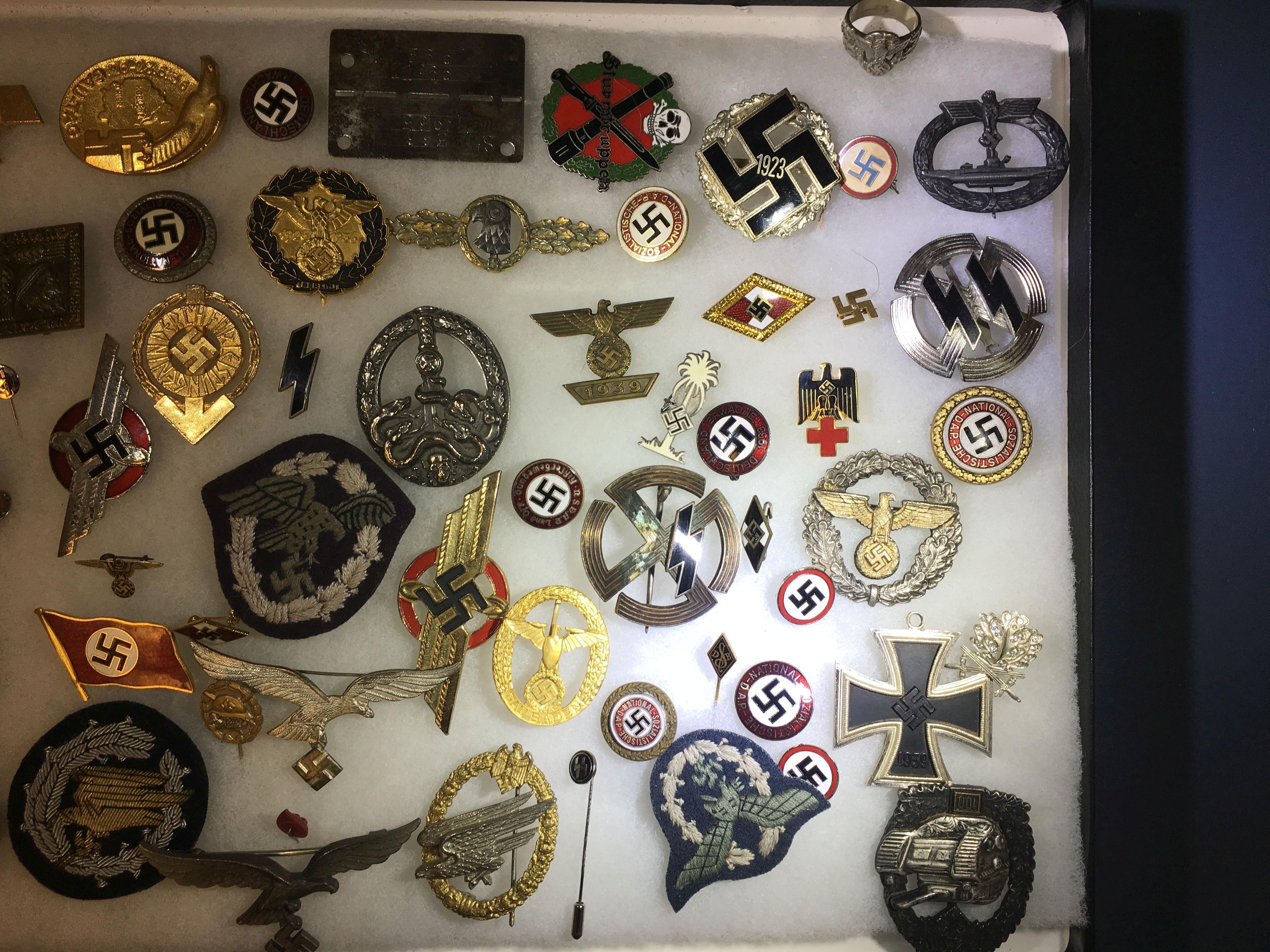 Collection of Nazi pins and badges. All items in lot photos are included.