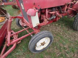 INTERNATIONAL CUB LOWBOY WITH FRONT HYDRAULIC