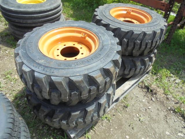 (4) 12-16.5 SSL Tires & 8 Bolt Rims, Unused