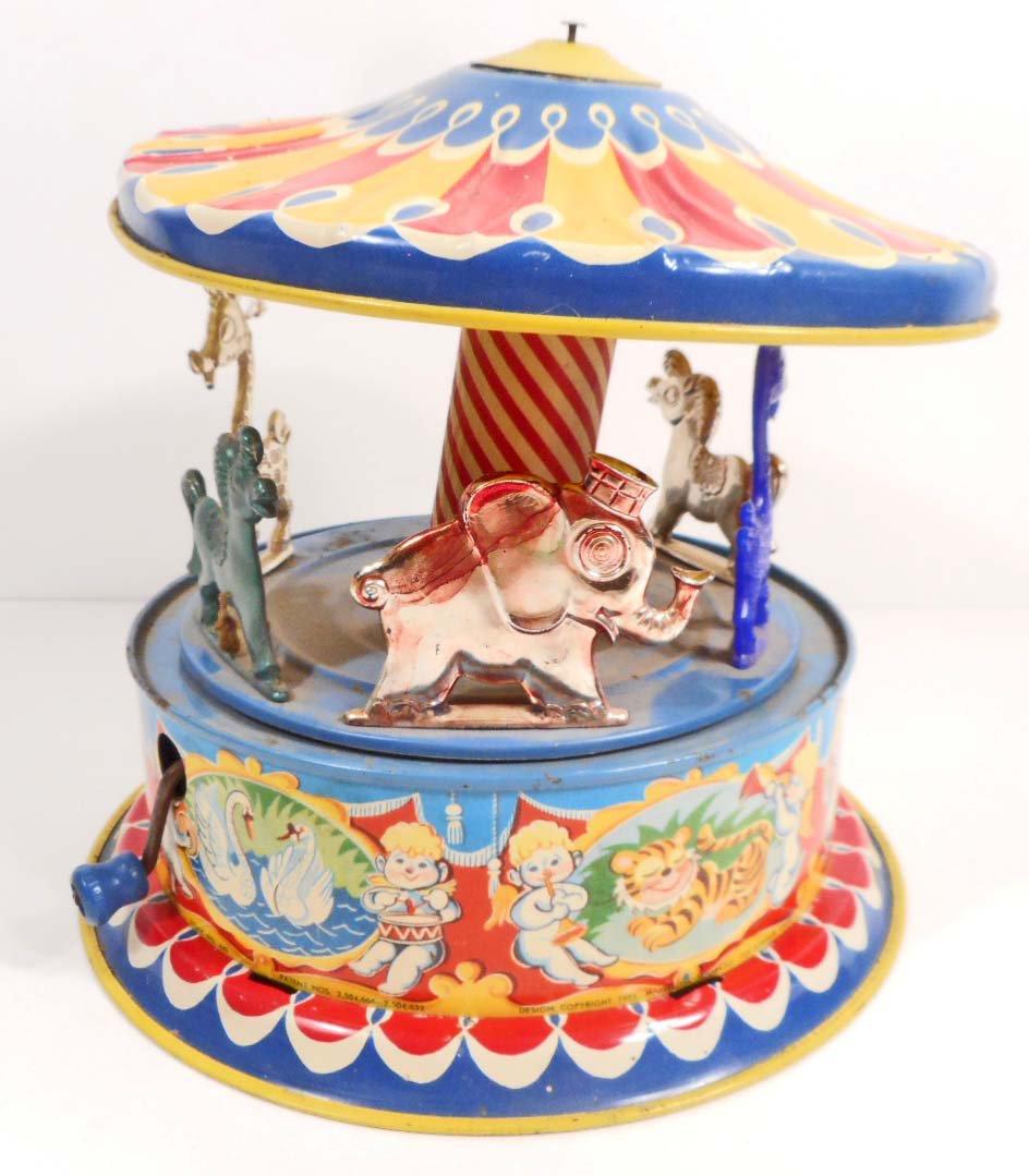 1951 MATTEL TIN LITHO TOY MERRY GO ROUND CAROUSEL