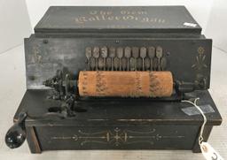 EARLY PRIMITIVE "THE GEM ROLLER ORGAN" COMES W/6 ROLLERS.