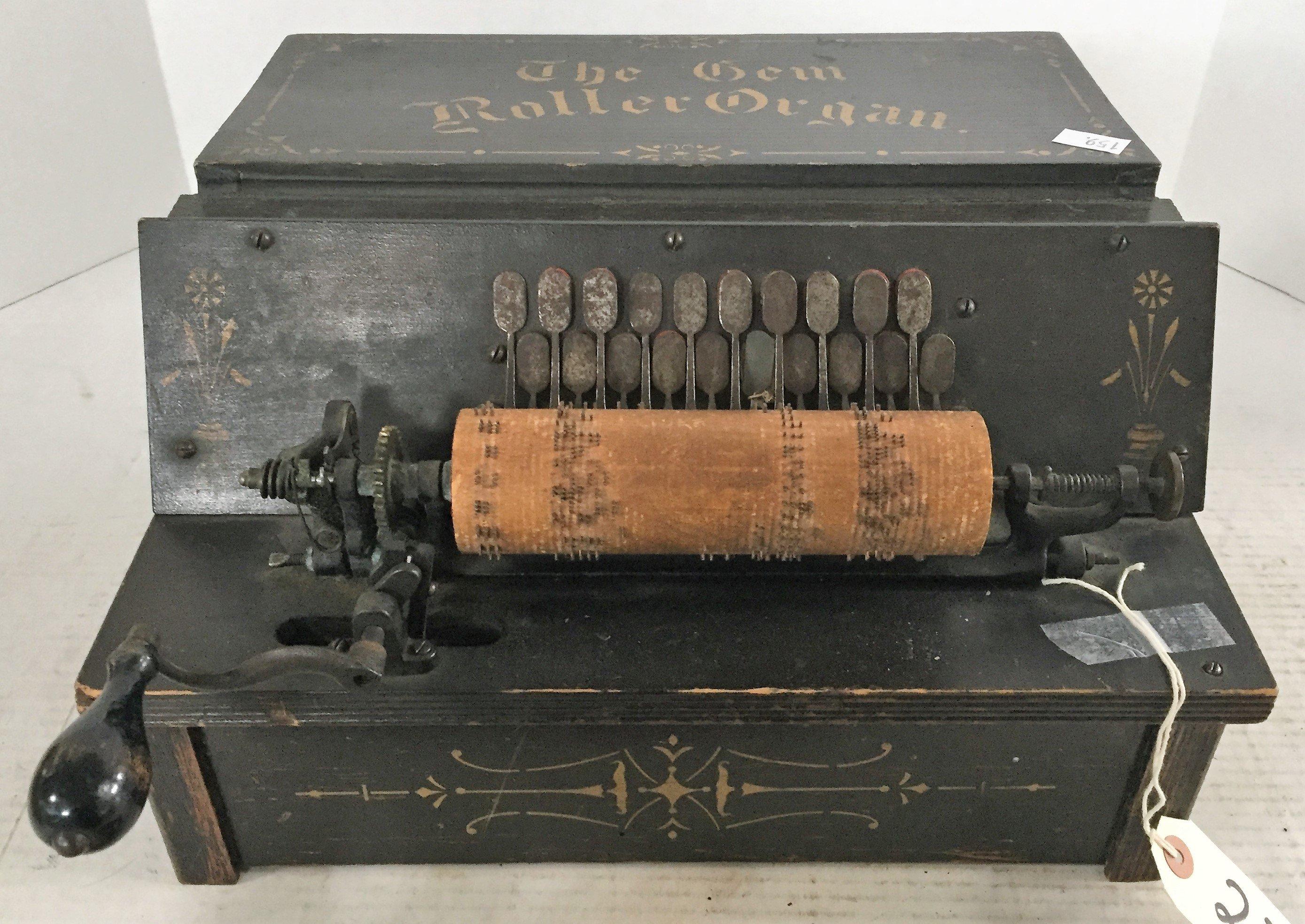 EARLY PRIMITIVE "THE GEM ROLLER ORGAN" COMES W/6 ROLLERS.