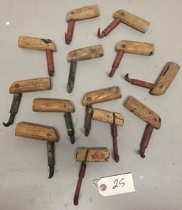 13 vintage hay hooks,