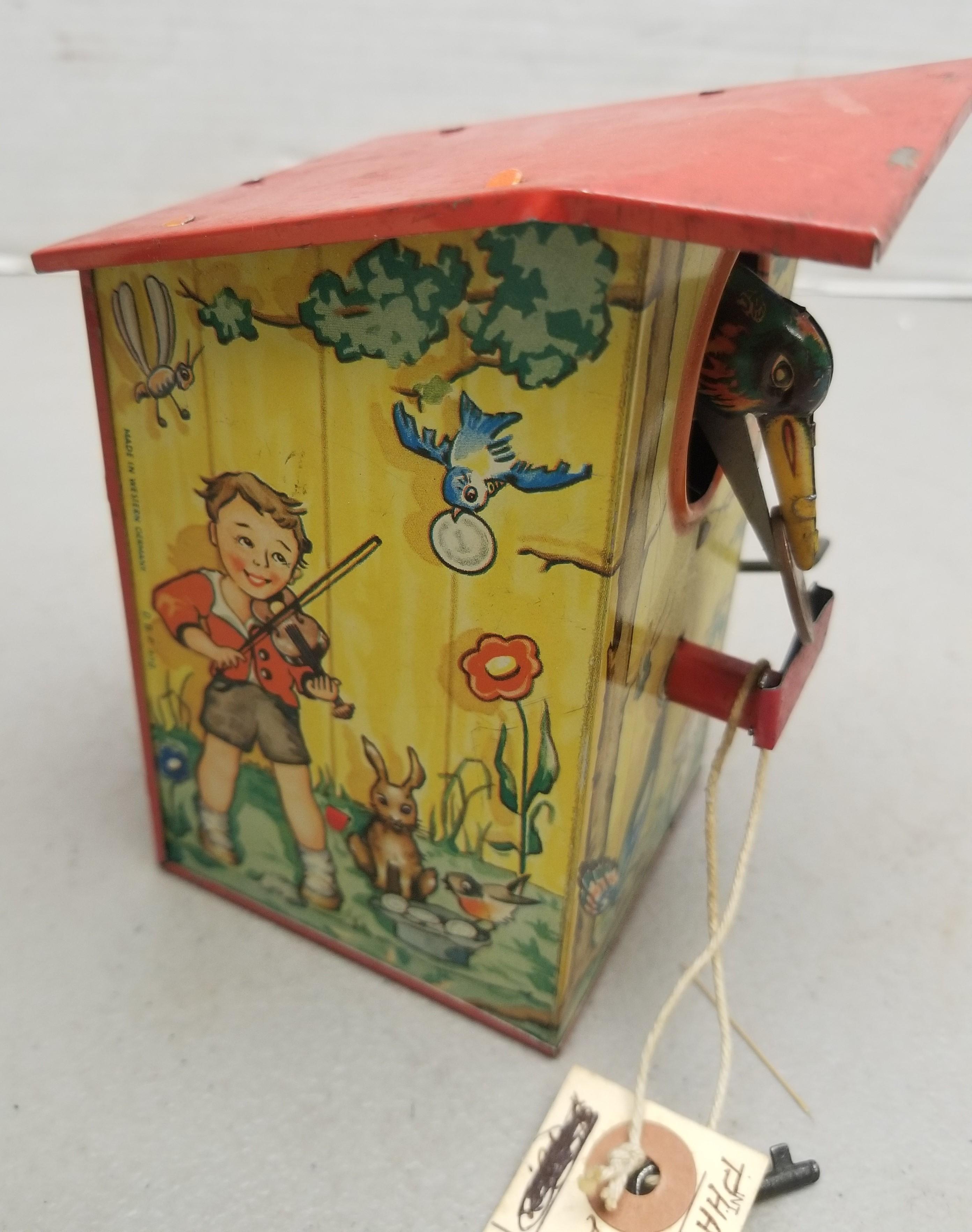 Early Tin Mechanical Coin Bank with Key