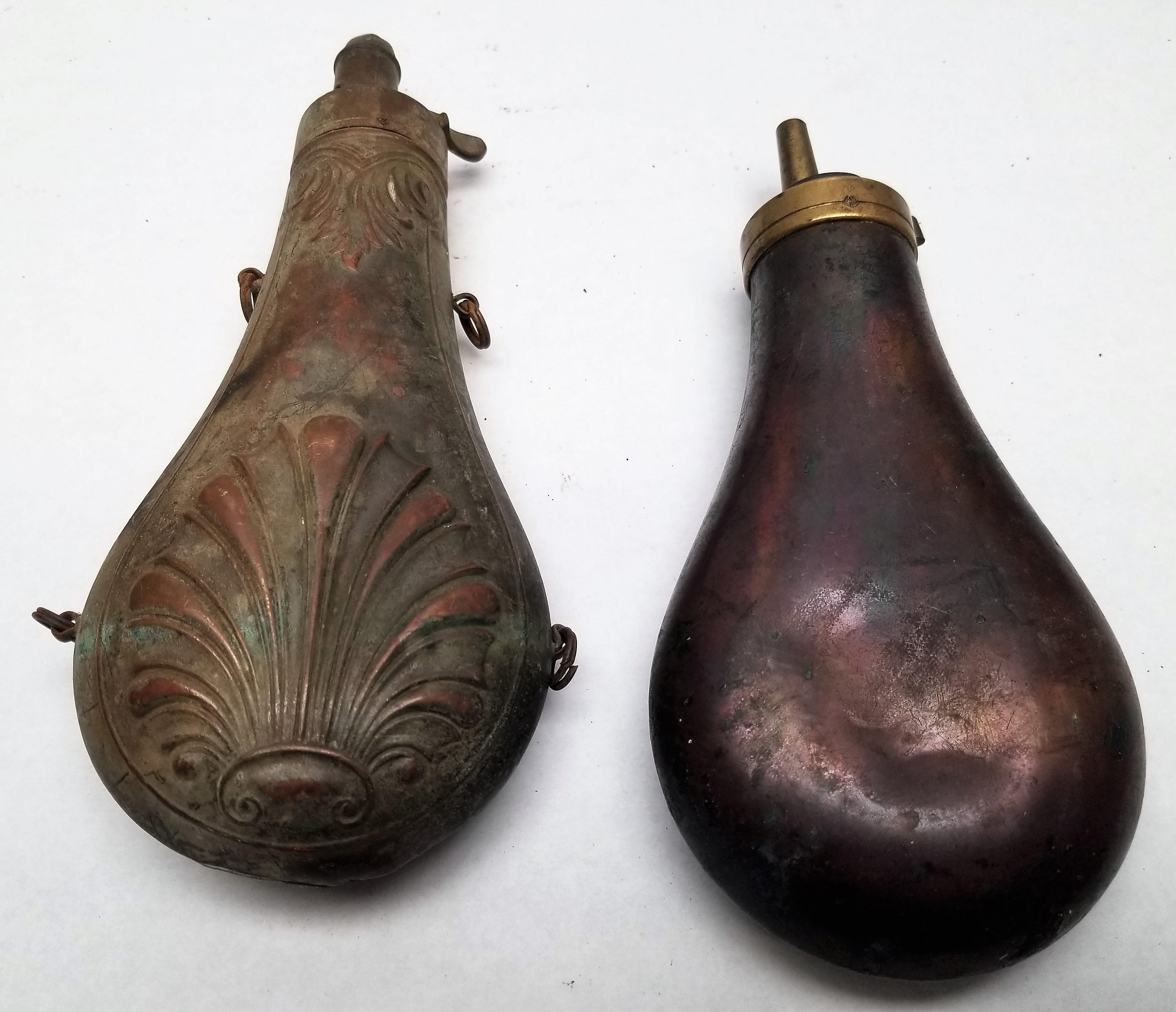 (2) Early Brass Embossed Powder Flasks