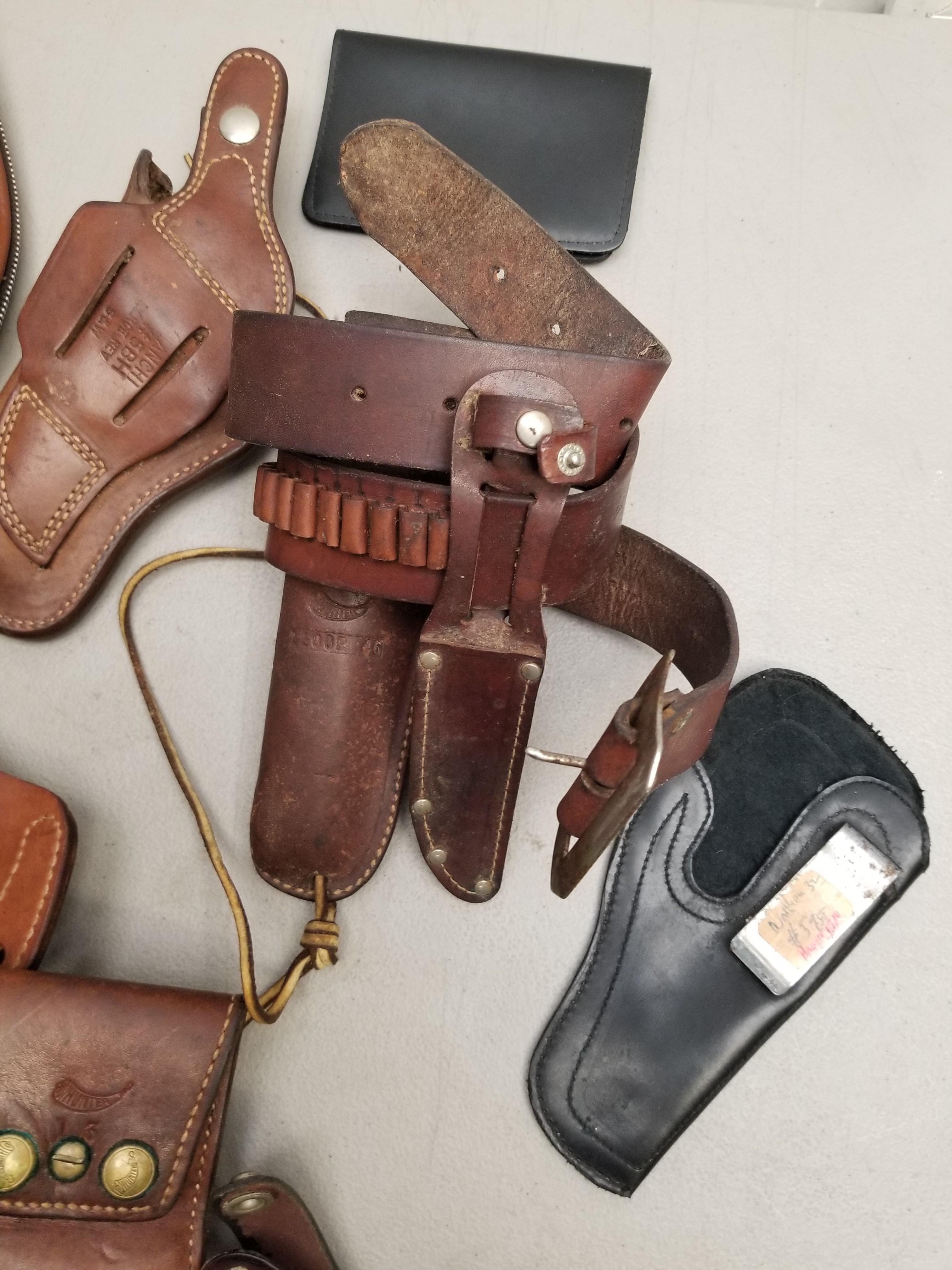 * Assorted Leather Pistol Holsters And More