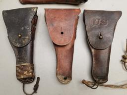 (4) Assorted U.S. Stamped Leather Pistol Holsters