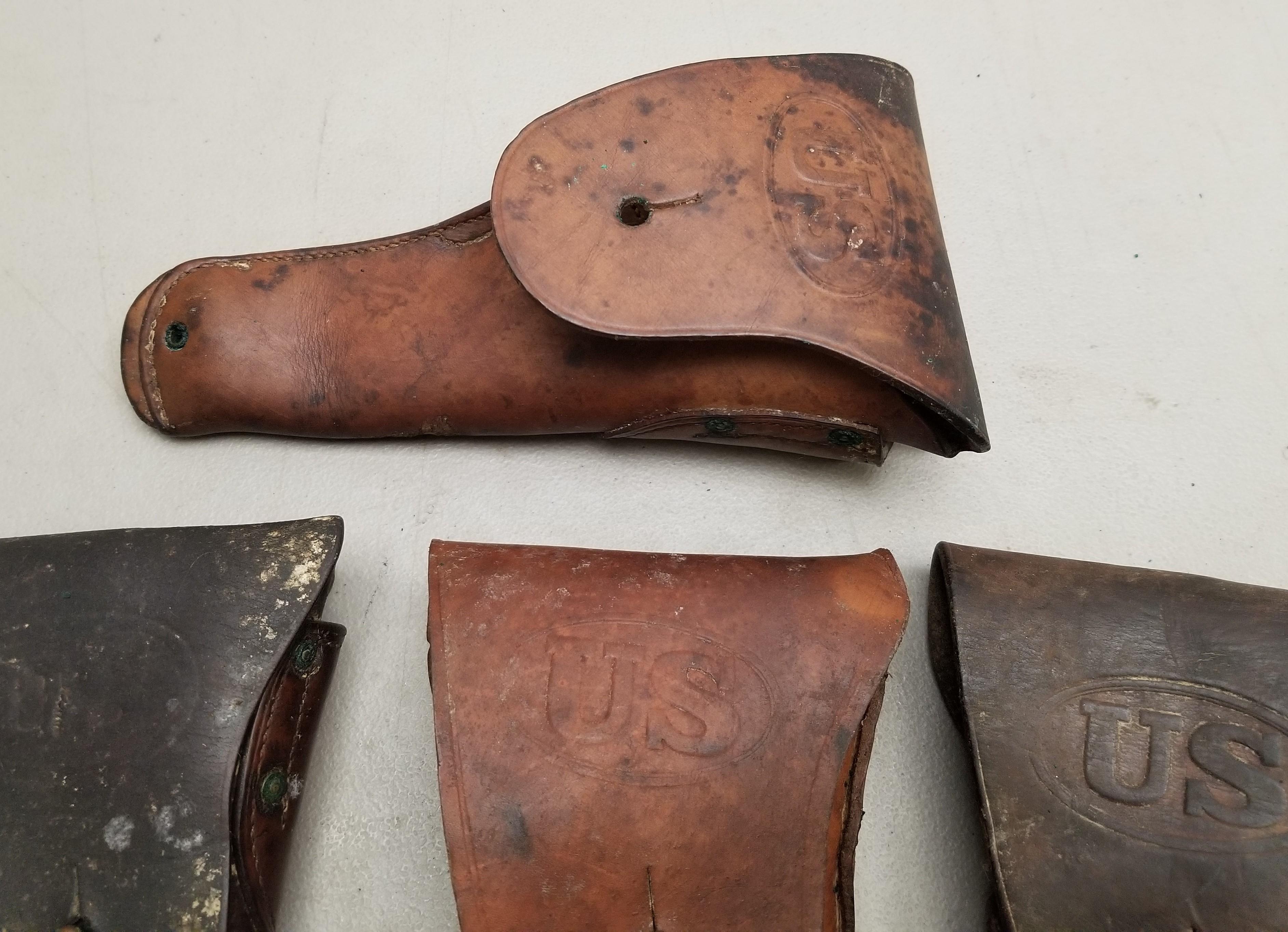 (4) Assorted U.S. Stamped Leather Pistol Holsters