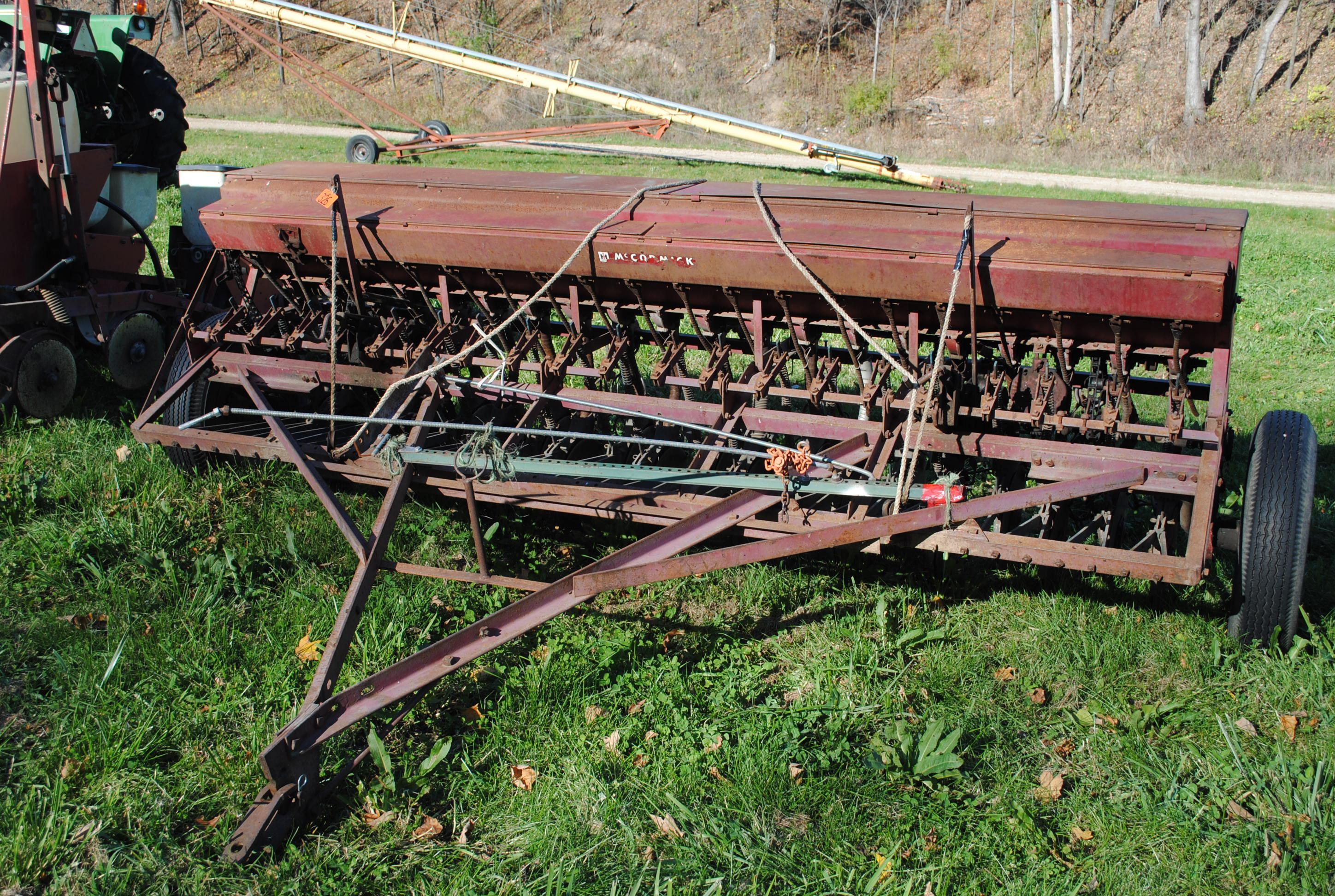 McCormick grain drill, double disc, low rubber with grass attachments, 10', been used & works good,