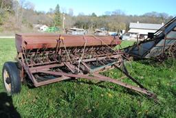 McCormick grain drill, double disc, low rubber with grass attachments, 10', been used & works good,