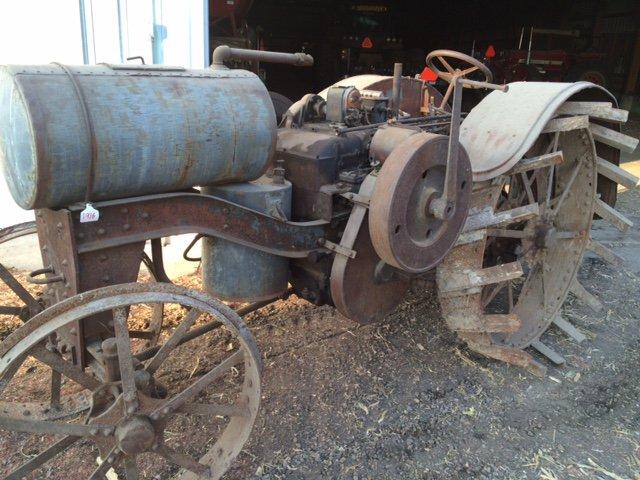 1020 Titan, complete, unrestored. Not running, engine is loose. Lugs for RR are there but not on rim