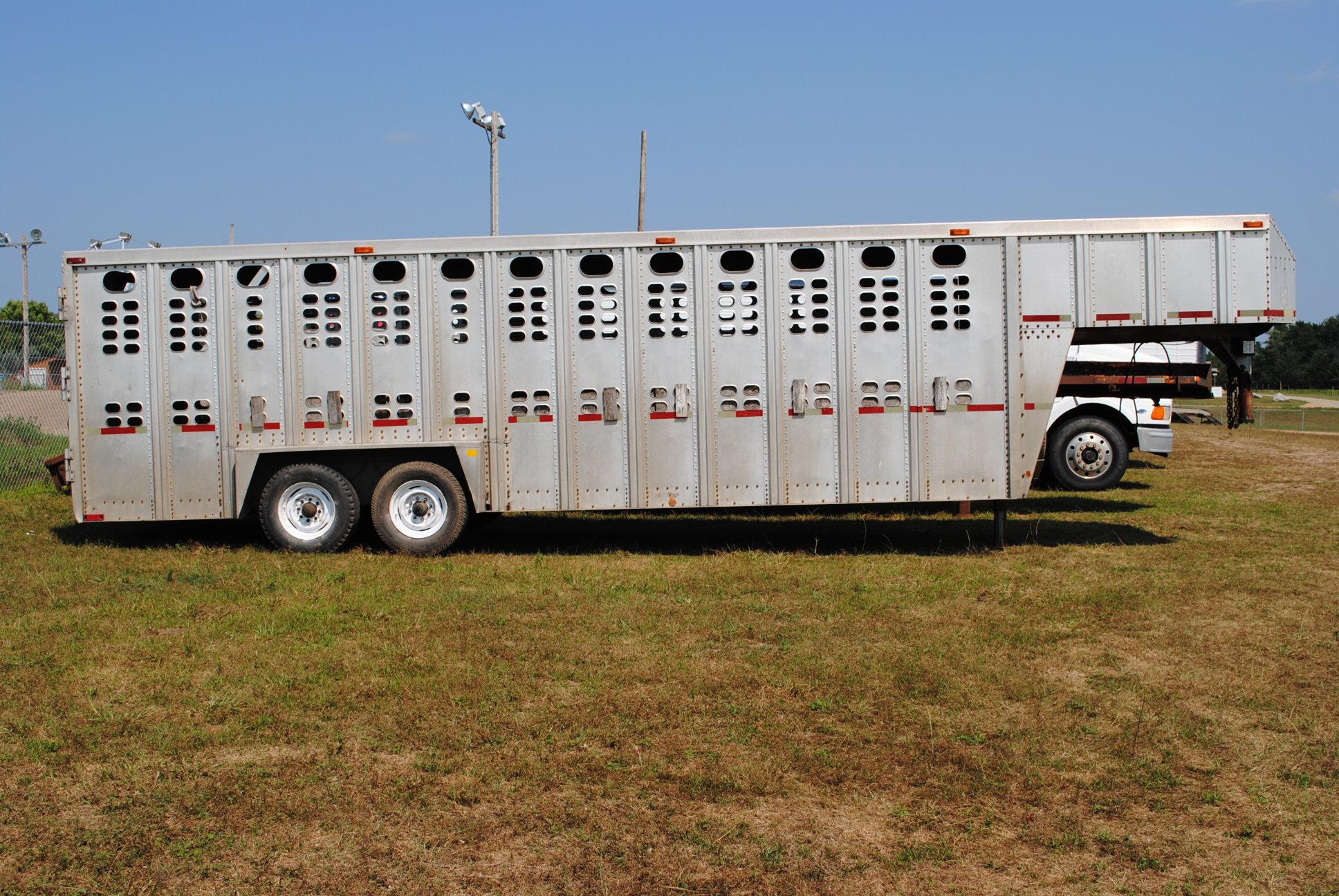 1988 Wilson 24' livestock trailer, usable trailer, the axles, bearings & brakes were all gone throug