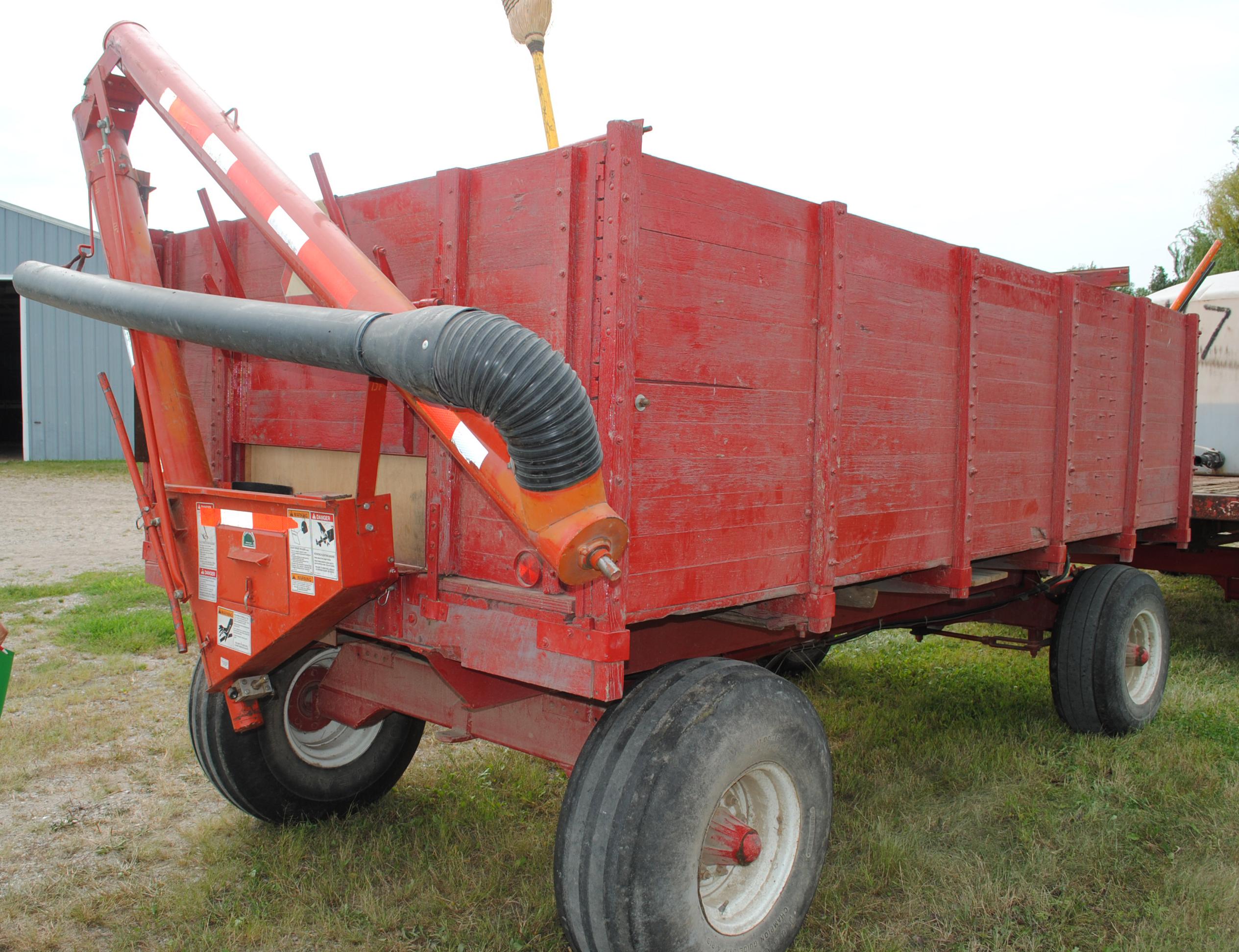 Barge box wagon with seed tender auger with hoist and 11x16 tires on 10-ton running gear;