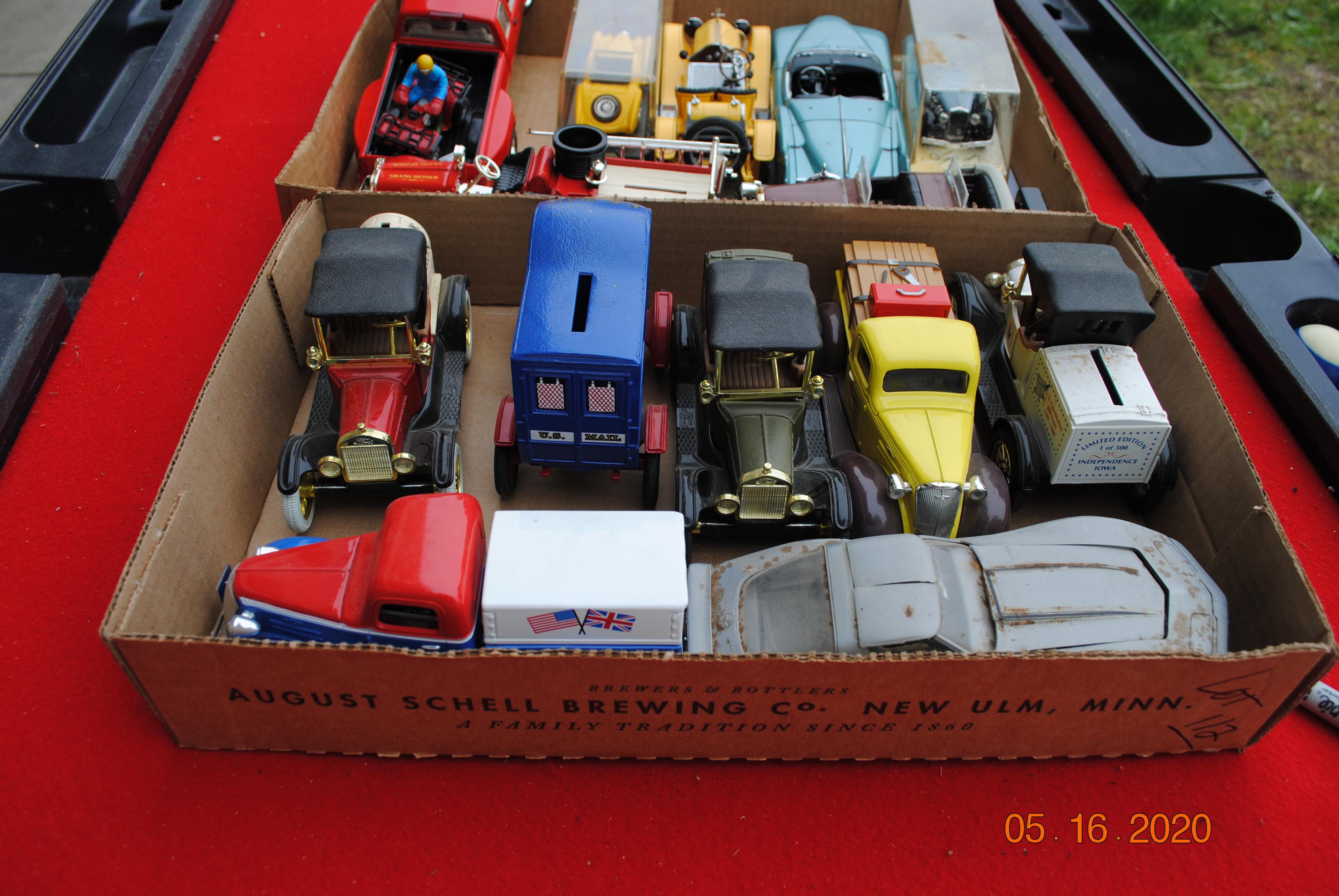 2 Boxes including misc. truck and car banks & misc. toys