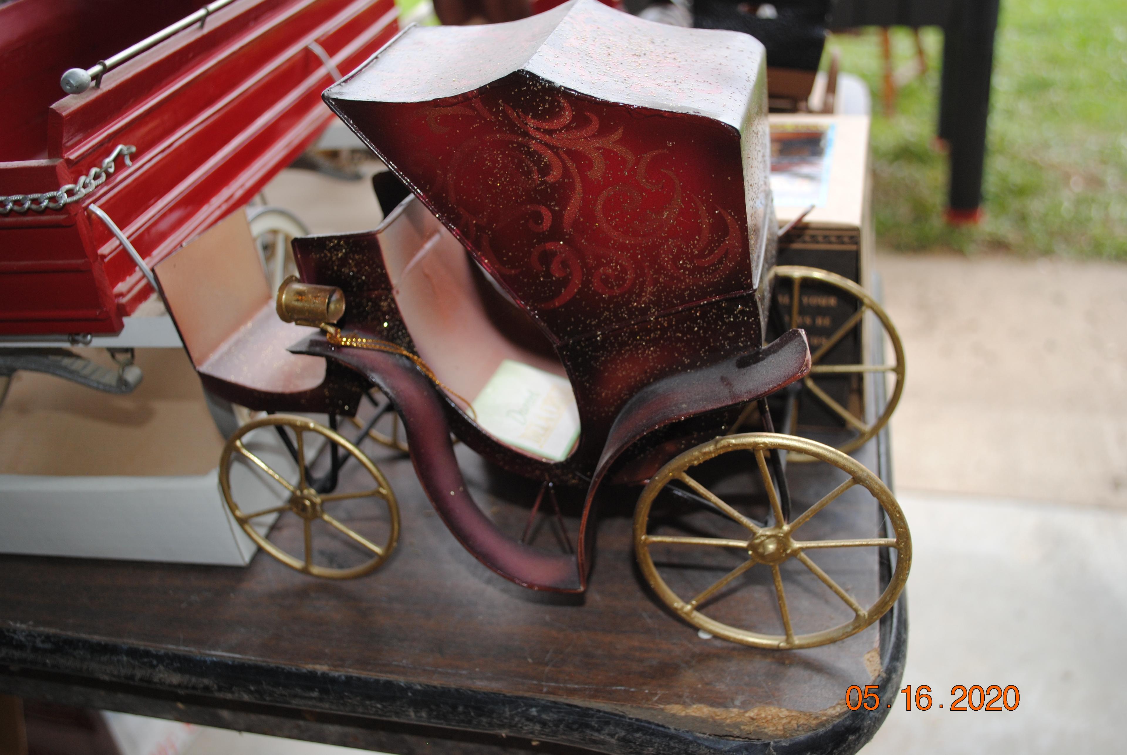 Several horses with wagons, carousel holiday around, Christmas buggy, circus wagon