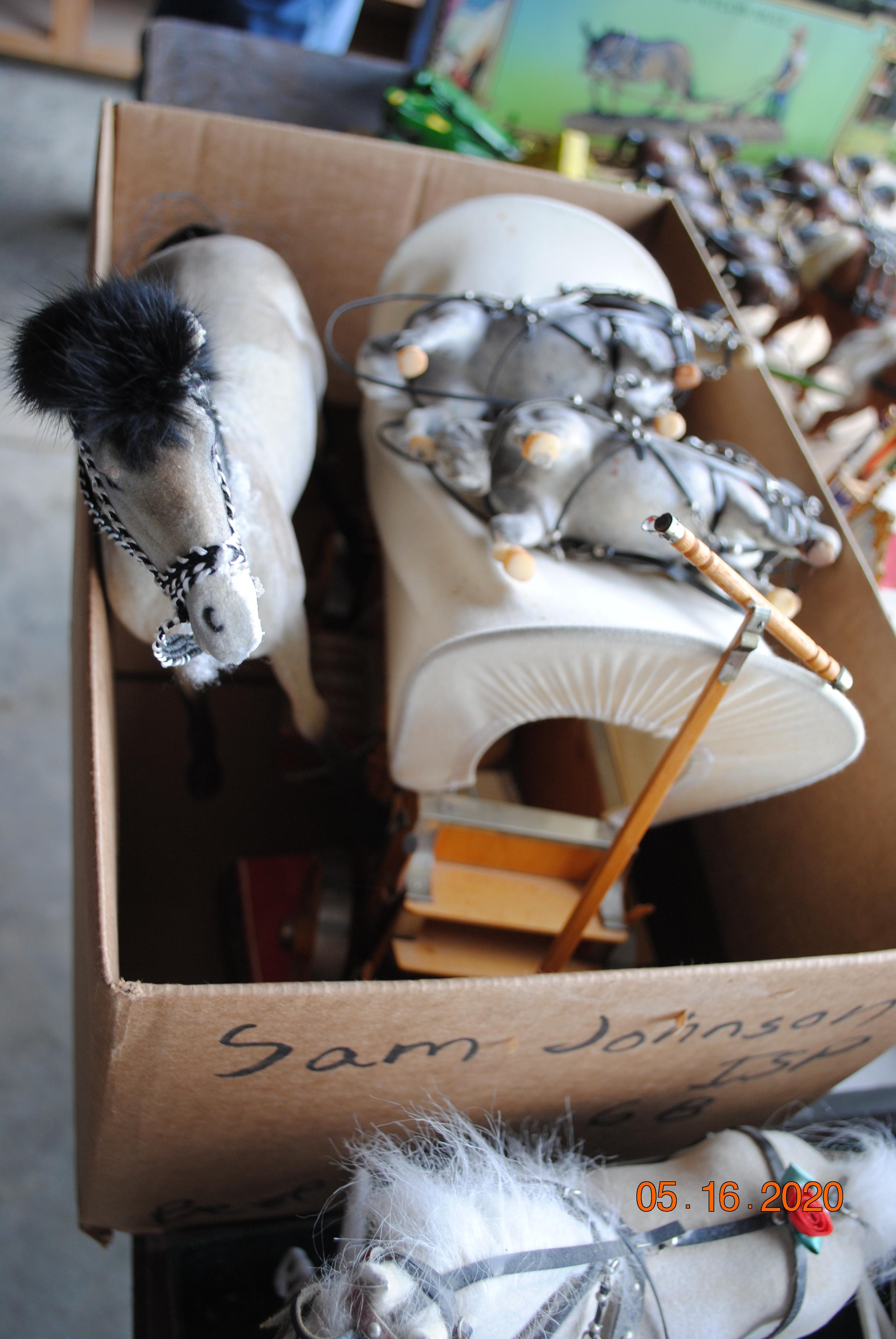 Several horses with wagons, carousel holiday around, Christmas buggy, circus wagon