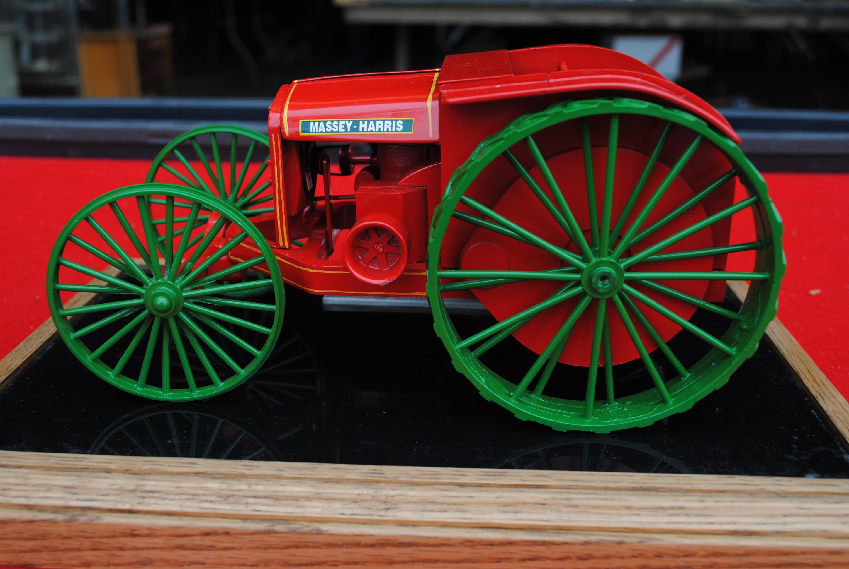 Massey Harris Model 53 tractor in display case