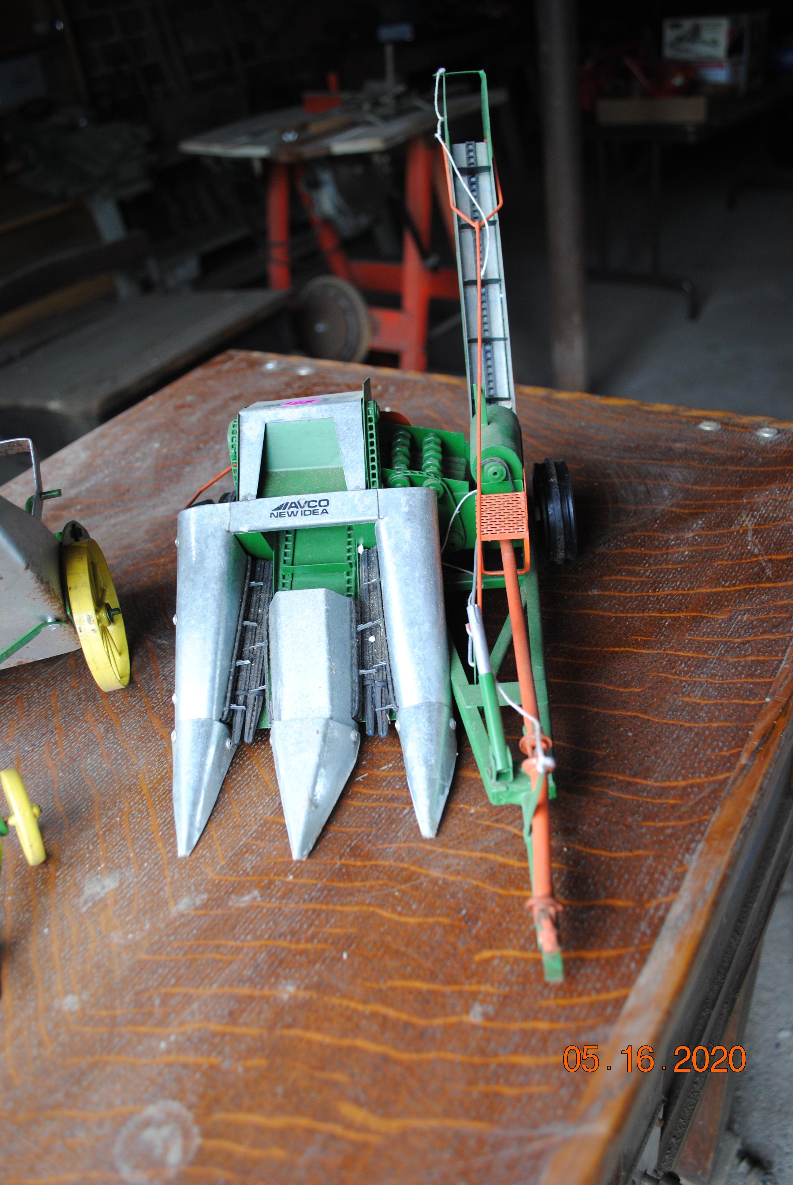 New Idea 2-row picker, John Deere hay loader, parts combine