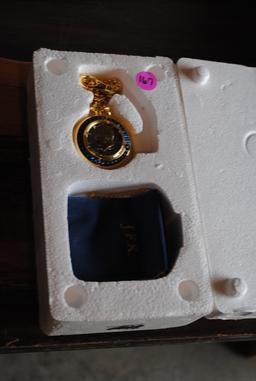 J.F.K. Pocket watch in styrofoam package