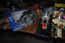 2 Boxes including motorcyle toys (Harley & American Chopper), and police bike