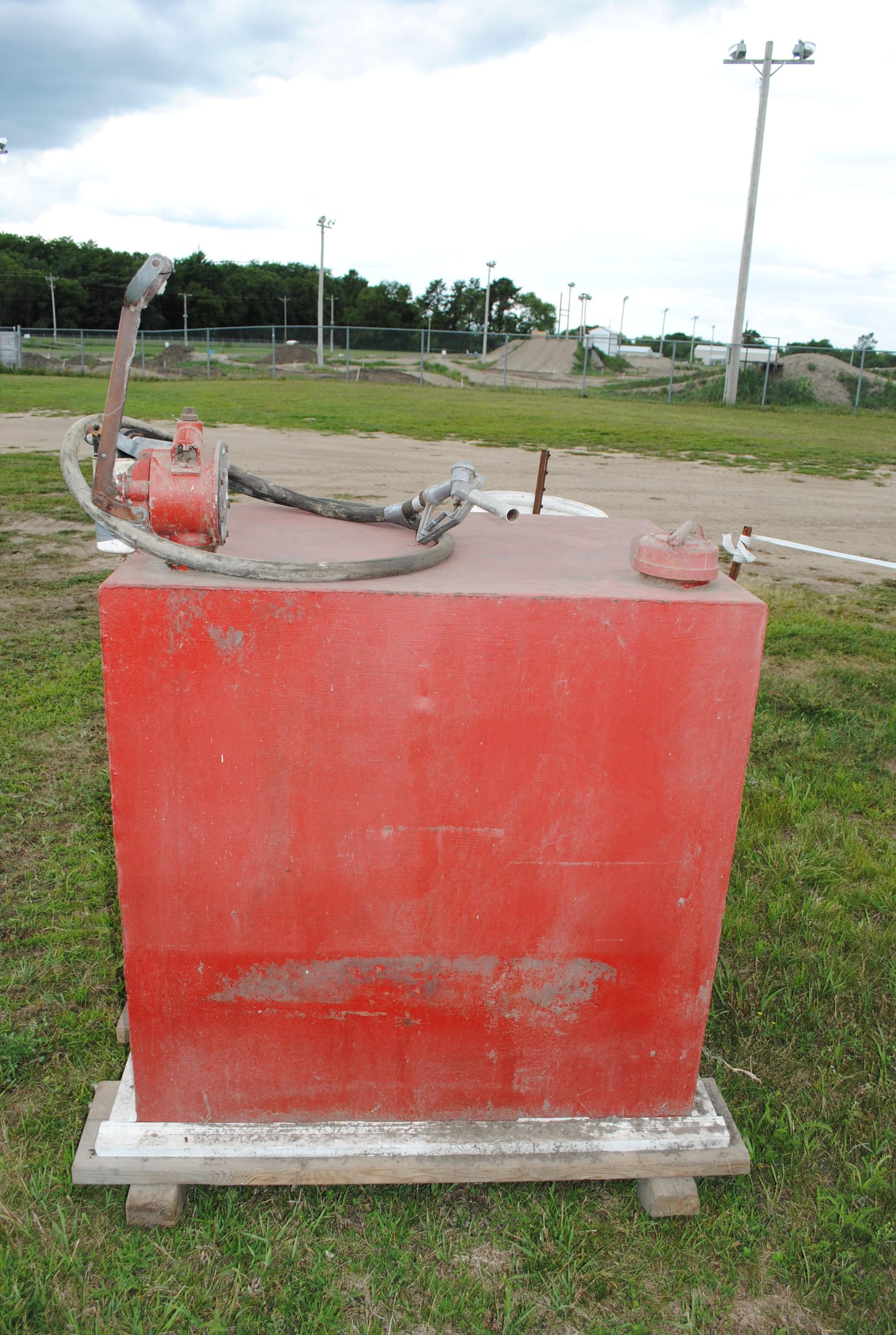 Approx. 200 gallon fuel tank with hand pump, filter & hose
