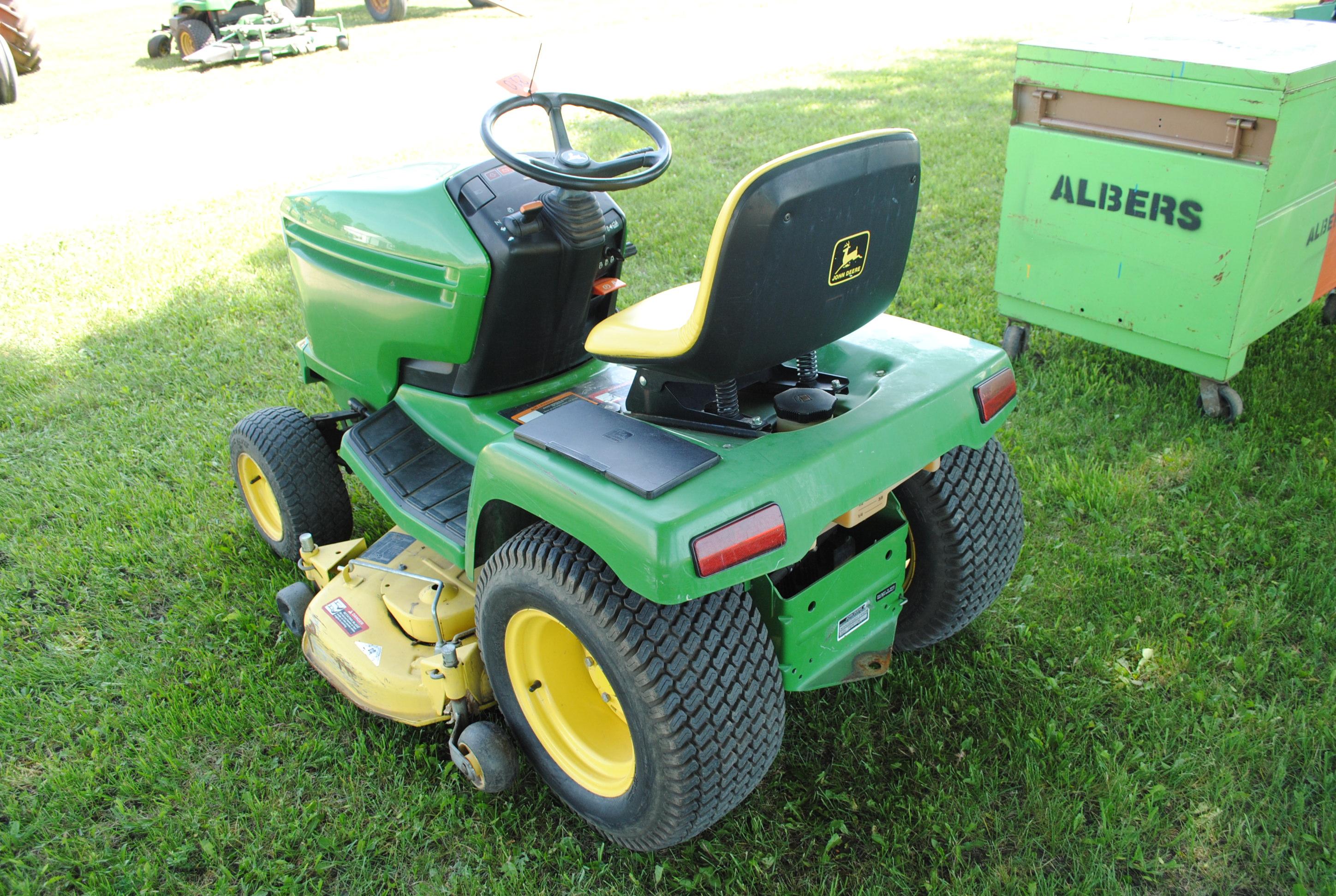 1996 John Deere 325 Riding Mower with 48" deck, hydrostatic, power steering, hydraulic lift, tilt wh