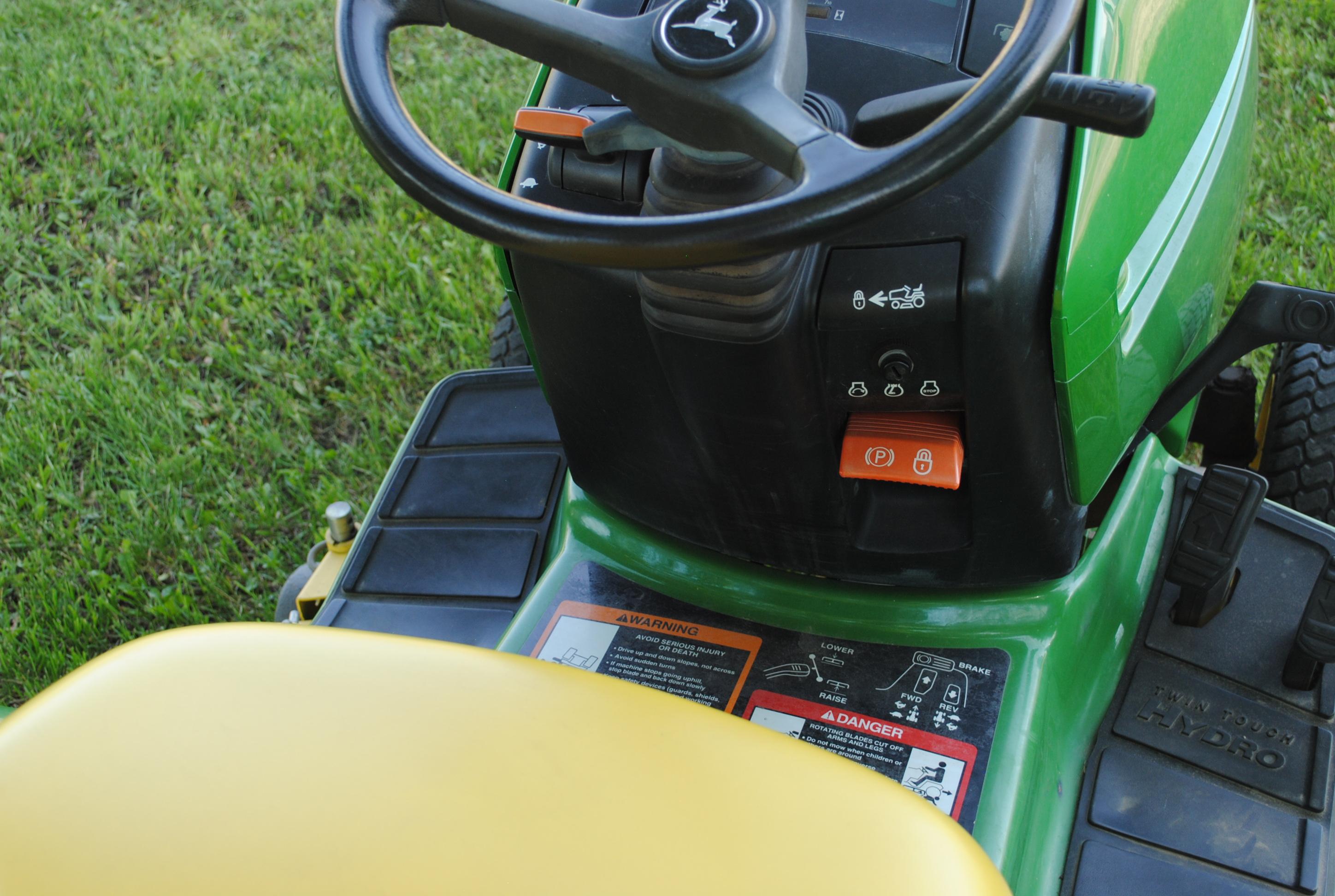 1996 John Deere 325 Riding Mower with 48" deck, hydrostatic, power steering, hydraulic lift, tilt wh