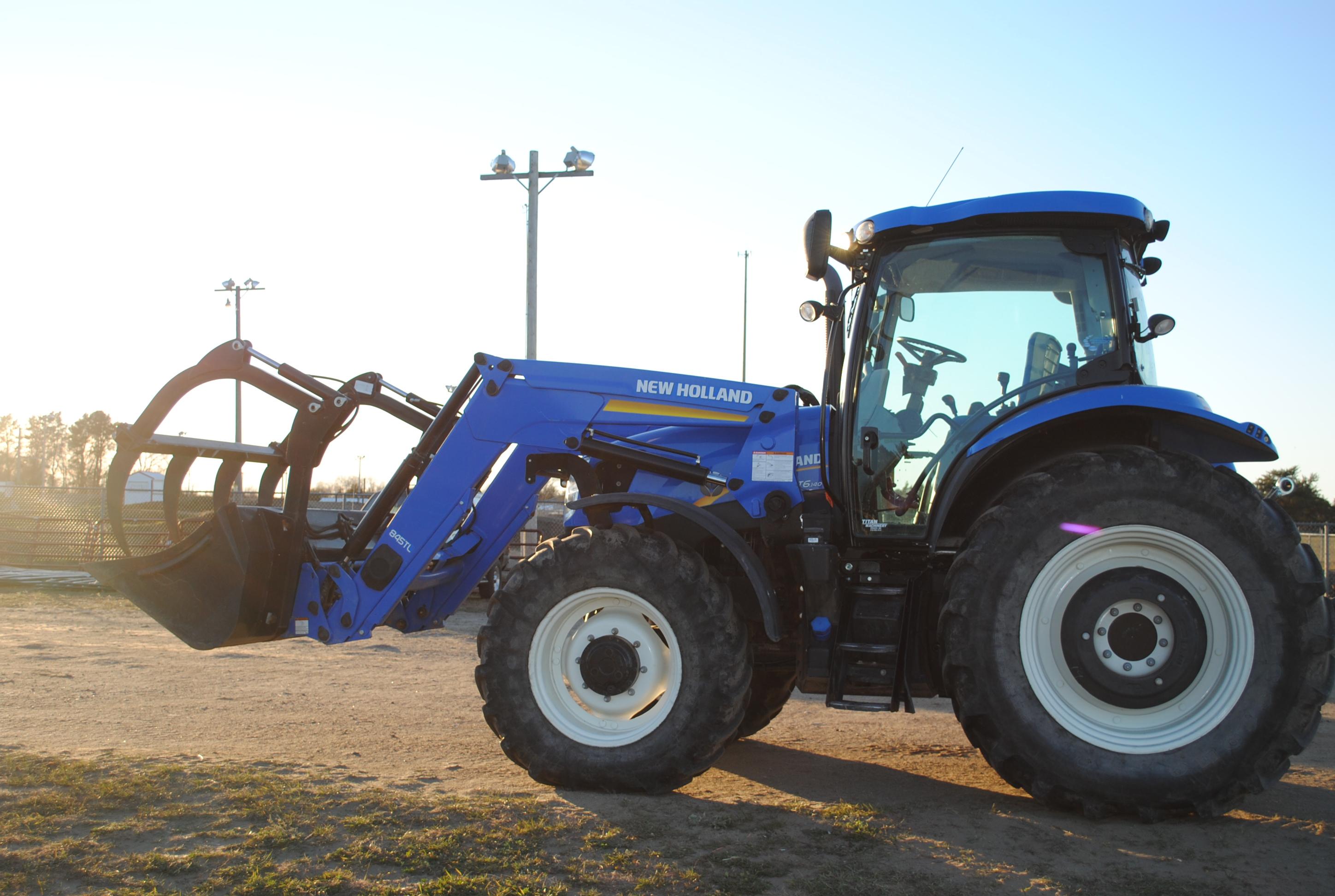 New Holland T6.140 Tractor with 845TL loader, front wheel assist, left hand reverse, 3-point, 1,000