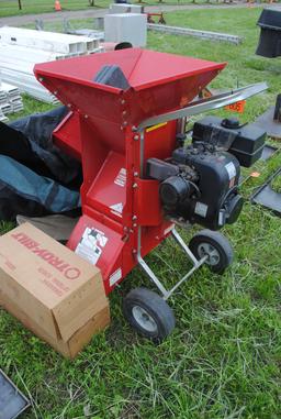 Troy-bilt Wood chipper  w/extra grates, has manual & cover