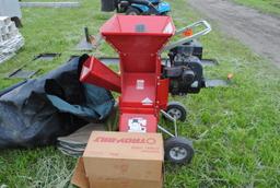 Troy-bilt Wood chipper  w/extra grates, has manual & cover