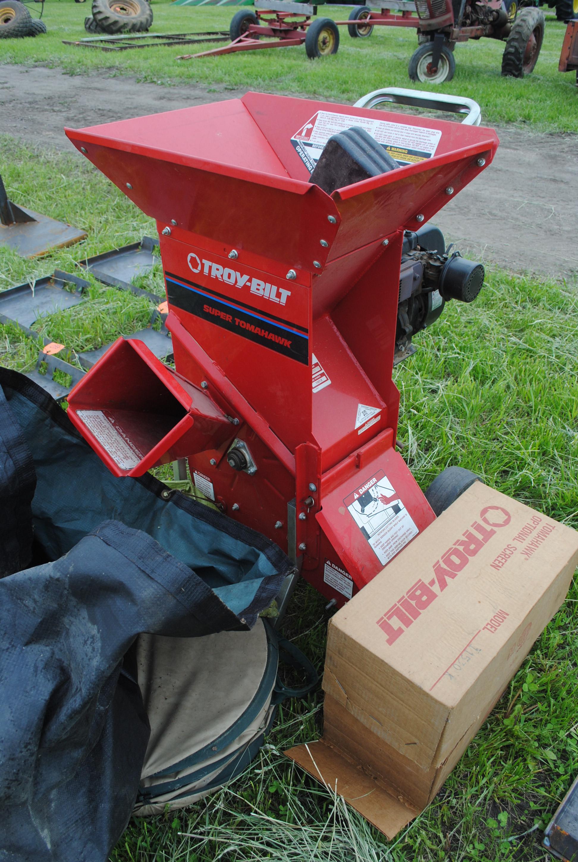 Troy-bilt Wood chipper  w/extra grates, has manual & cover