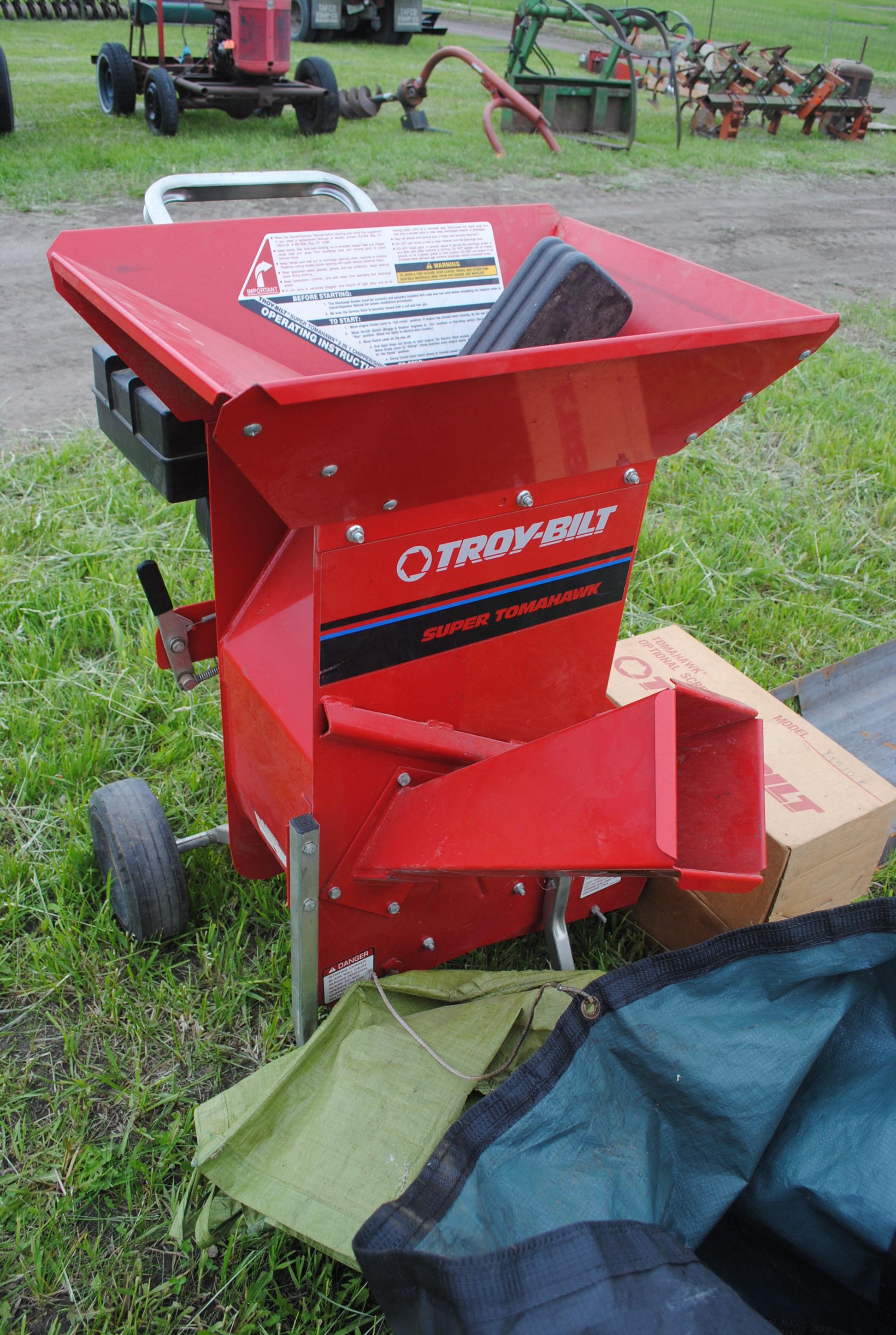 Troy-bilt Wood chipper  w/extra grates, has manual & cover