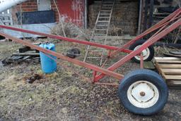 Pto Auger on transport approx. 55' +/- by 8" (Feterl?)