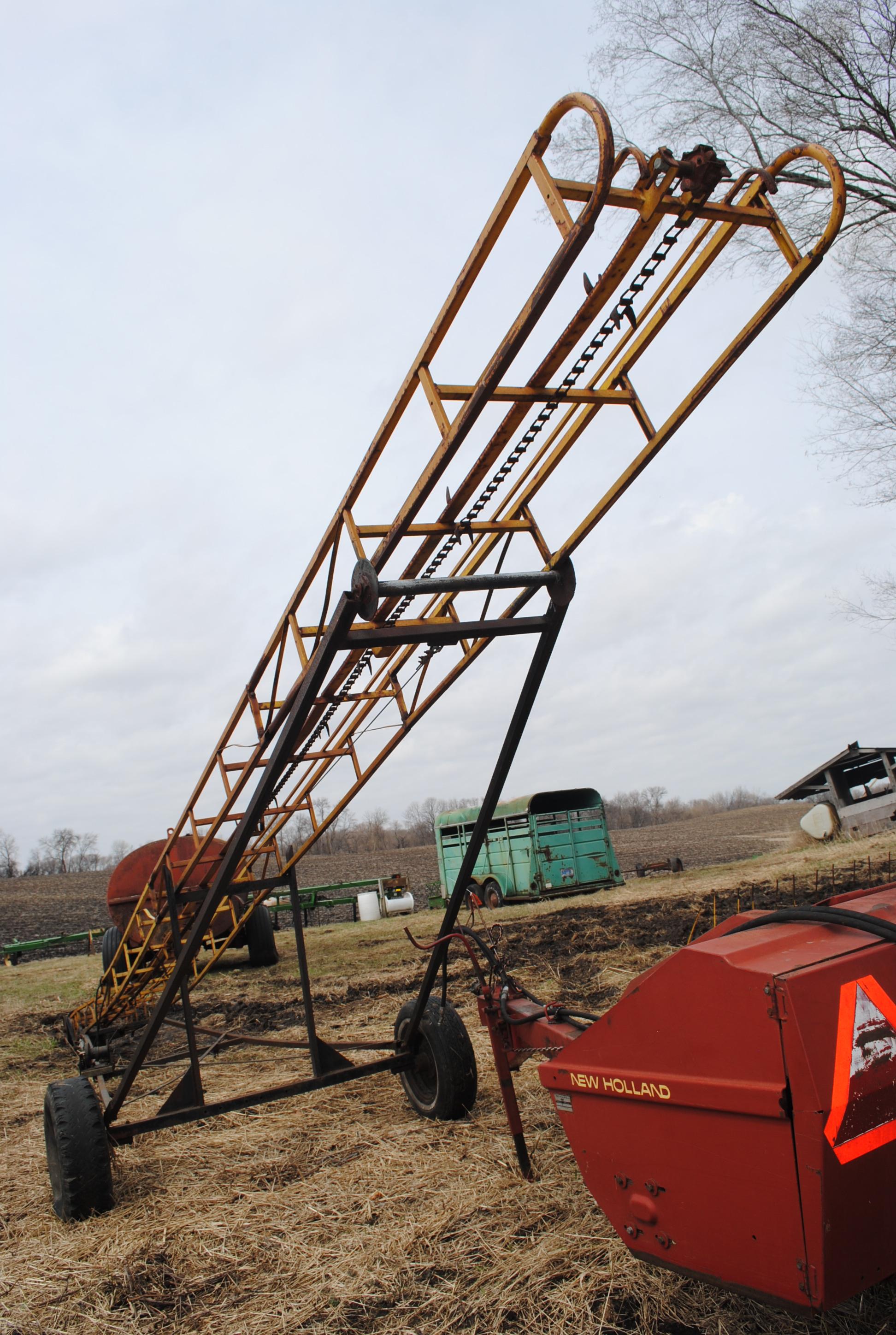 30' +/- Hay Elevator on transport with electric motor, slight bend