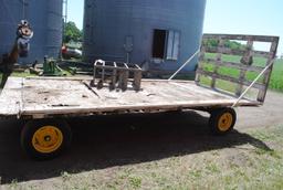 8'x17' Hay Rack on Kasten running gear with extendable pole (Contents not included)