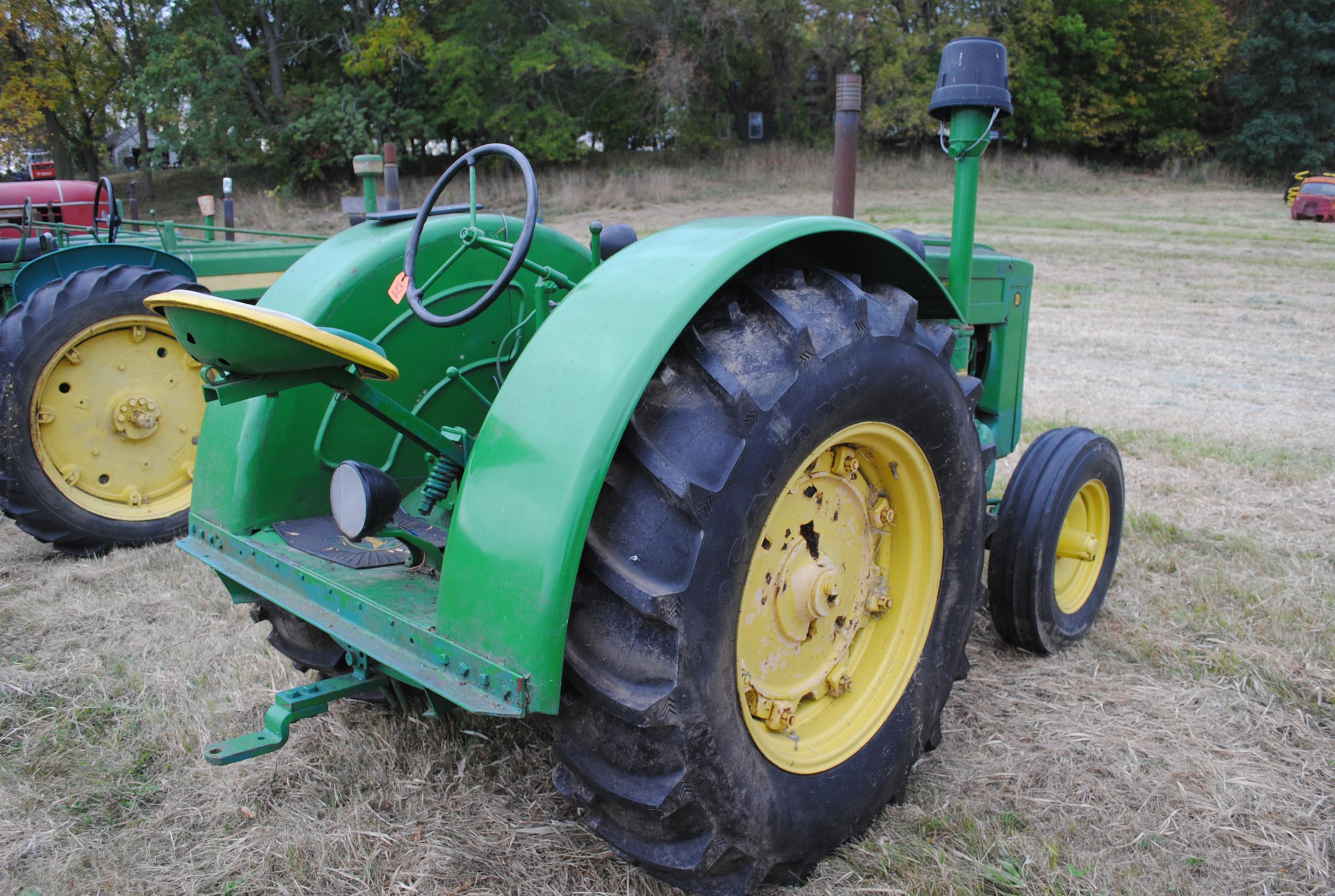 John Deere 'D', fenders, lights, electric start, 16.9-30 rears, 7.50-18 fronts, tires are near new,