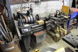 Champion Tool Works Company belt driven lathe has plate that states F.E. Satterlee Company Wood