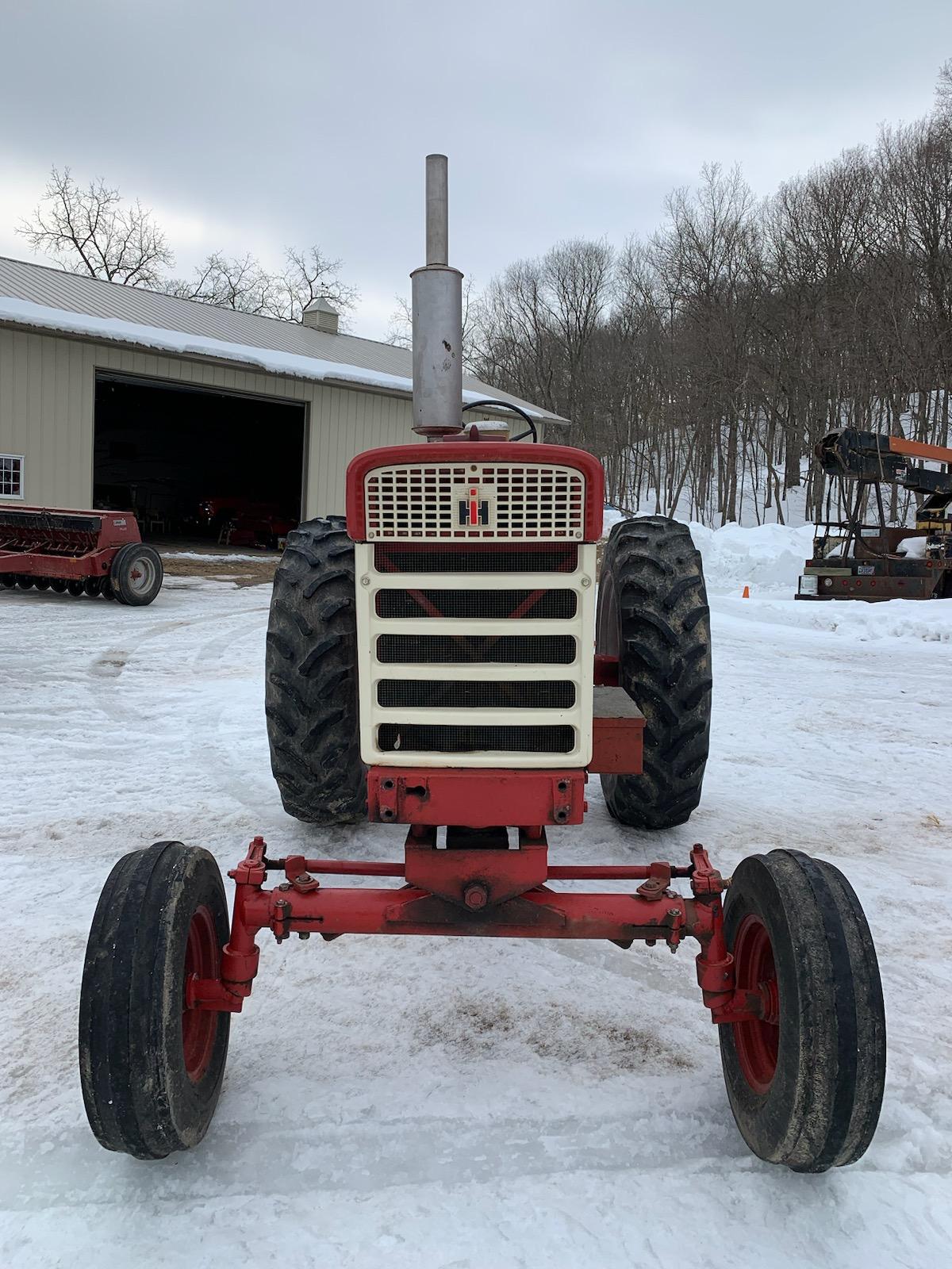 Farmall 560 Diesel, wide front, belt pulley, fast hitch, owner states “approximately 5,800 hours - h